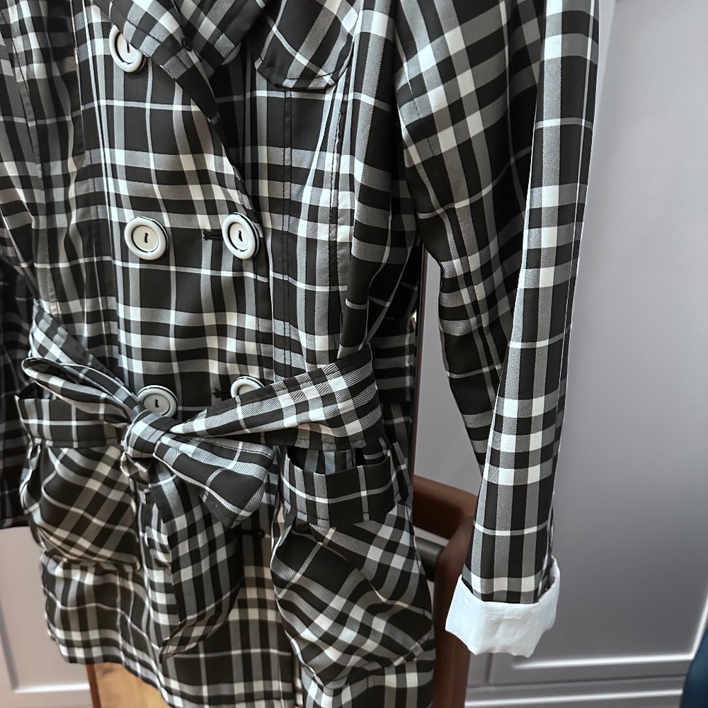 Checkered trench coat.